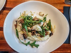 fish with mashed potatoes, mushrooms and rucola at Allende