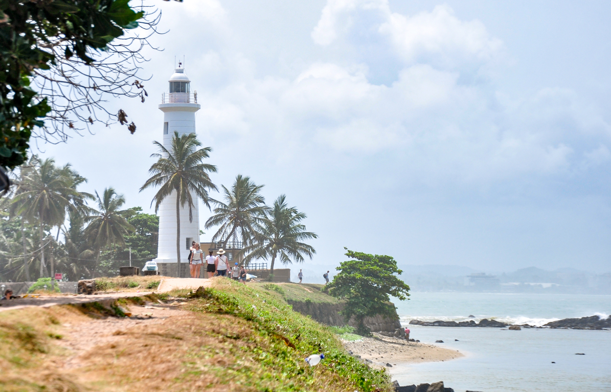 lighthouse on a sandy beach